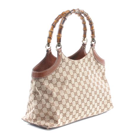 gucci monogram with bamboo handles|gucci designer handbags.